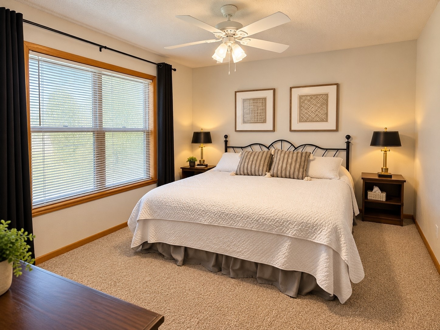 King bedroom with natural light and lake house finishes